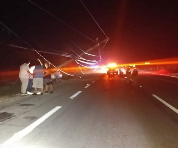 CFE repairs highway pole left suspended by dozing driver