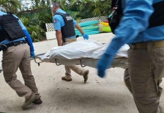 Cancun Hotel Zone Tourist Police remove body reported floating under Calinda bridge