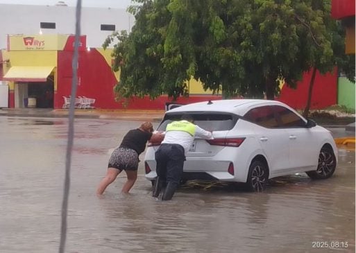 Chetumal left waterlogged by system crossing over southern Yucatan Peninsula
