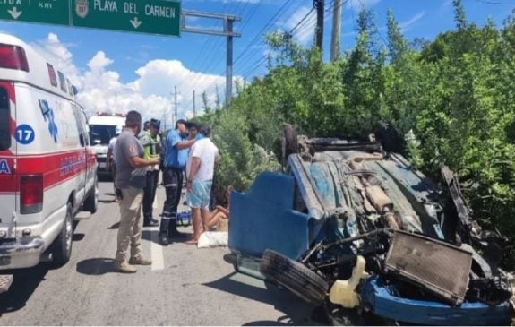 Driver rolls car avoiding rock on section of Tulum highway