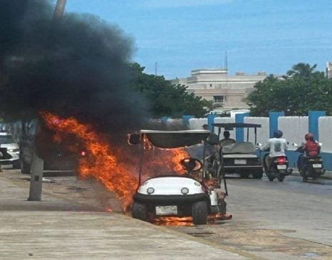 Isla Mujeres firemen were called to the scene of a golf cart fire
