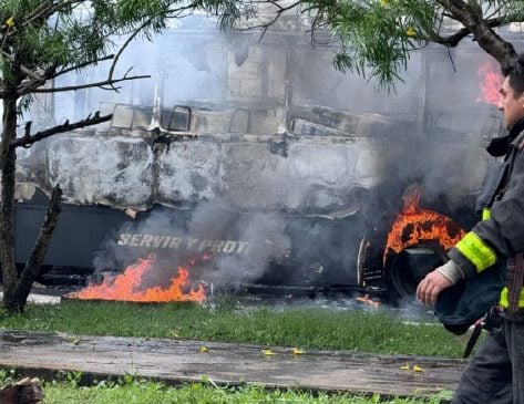 Bus burned and five arrests made during police clash with Playa del Carmen land invaders
