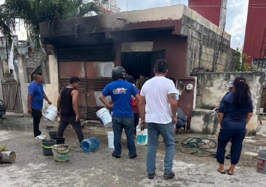 Parked vehicle burst into flames inside Puerto Aventuras garage