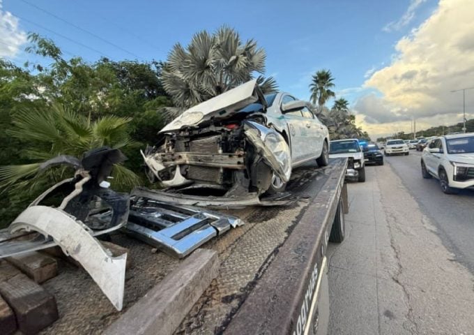 Oncoming taxi gets the worst of it in a three vehicle highway collision