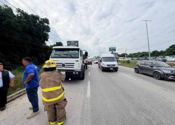 Dozing driver flips passenger bus hampering Cancun highway traffic