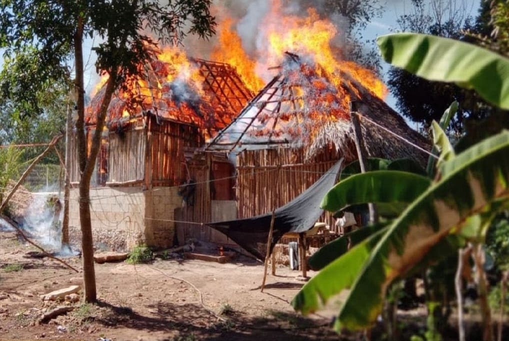 Afternoon fire consumes two wood frame and grass topped homes