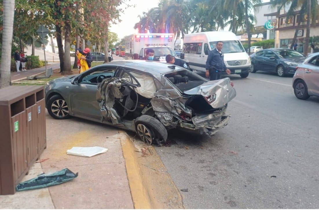 Firemen cut accident victim free from collision in Cancun Hotel Zone